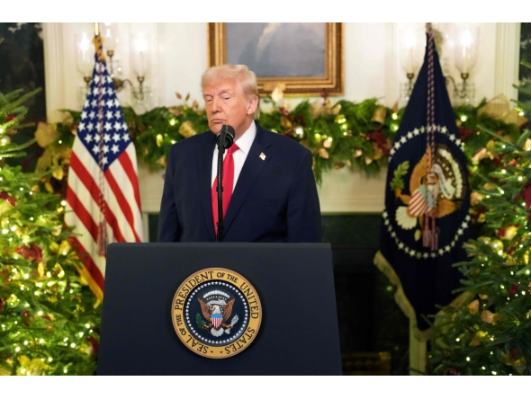 US President Donald Trump addresses the nation from the Diplomatic Reception Room of the White House in Washington, DC, on December 17, 2025. Photo by Doug MILLS / POOL / AFP