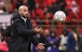 Morocco's head coach Walid Regragui throws a ball during the Africa Cup of Nations (CAN) group A football match between Morocco and Comoros at Prince Moulay Abdellah Stadium in Rabat on December 21, 2025. (Photo by Sebastien Bozon / AFP)