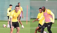 Al Gharafa’s Joselu (left) and teammates attend a training session.  