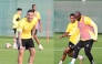 Al Gharafa’s Joselu (left) and teammates attend a training session.  