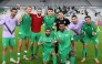 Al Ahli players celebrate their win.