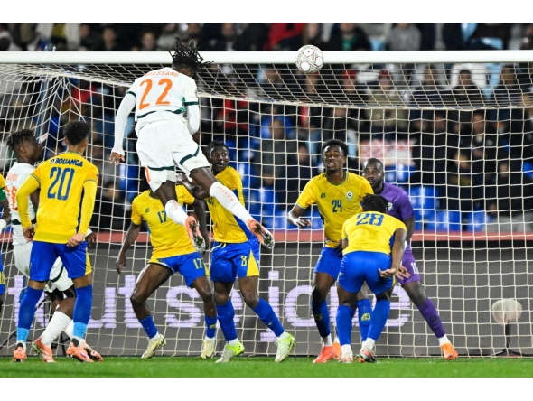 Ivory Coast's forward #22 Evann Guessand scores his team's second goal during the Africa Cup of Nations (CAN) Group F football match between Gabon and Ivory Coast at the Grand Stadium in Marrakech on December 31, 2025. (Photo by Khaled DESOUKI / AFP)
