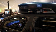 Lucid, Nuro, and Uber unveil a robotaxi during Nvidia Live at CES 2026 ahead of the annual Consumer Electronics Show in Las Vegas, Nevada, on January 5, 2026. (Photo by Patrick T. Fallon / AFP)
