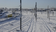 SNCF railway tracks are covered in snow in La Rochelle, western France, on January 6, 2026. (Photo by Amelia BLANCHOT / AFP)