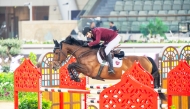 Qatar's Mohammed K. Al Baker guides Dukhan over a fence during the CSI5* – 1.40m event.