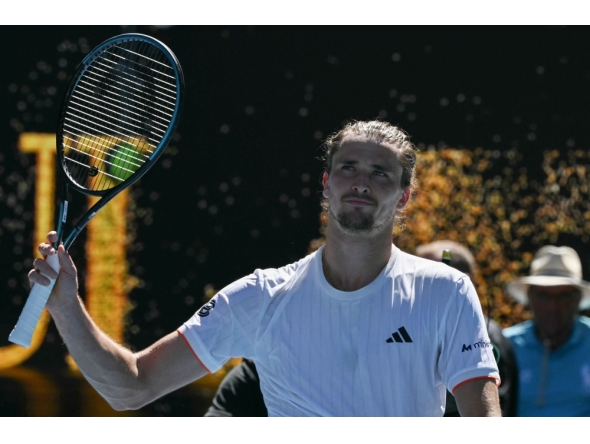 Germany's Alexander Zverev celebrates after his victory against Canada's Gabriel Diallo during their men's singles match on day one of the Australian Open tennis tournament in Melbourne on January 18, 2026. (Photo by Paul Crock / AFP)