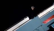 US President Donald Trump walks off Air Force One on January 19, 2026 in Joint Base Andrews, Maryland. Anna Moneymaker/Getty Images/AFP