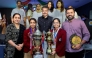 Students and teachers of Bhavan’s Public School pose with the trophies.