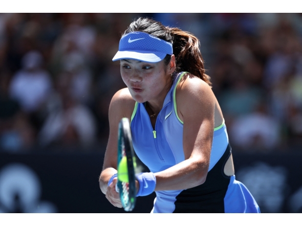 Britain's Emma Raducanu hits a return to Austria's Anastasia Potapova during their women's singles match on day four of the Australian Open tennis tournament in Melbourne on January 21, 2026. (Photo by Martin Keep / AFP) 