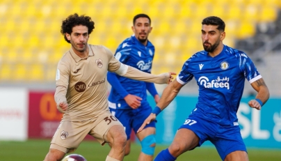 Action during the match between Al Rayyan and Al Khor.