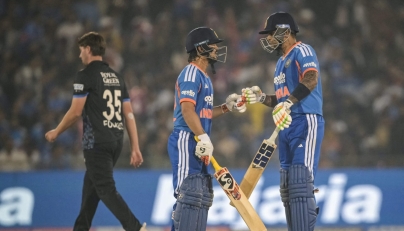 India's Ishan Kishan and Suryakumar Yadav bump their fists during the second Twenty20 international cricket match between India and New Zealand at the Shaheed Veer Narayan Singh International cricket Stadium in Raipur on January 23, 2026. (Photo by Dibyangshu SARKAR / AFP)
