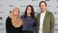 (L-R)  Isra'a, Itab Azzam and Jack MacInnes attend the 