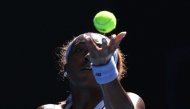 USA's Coco Gauff serves to Czech Republic's Karolina Muchova during their women's singles match on day eight of the Australian Open tennis tournament in Melbourne on January 25, 2026. (Photo by Martin Keep / AFP)