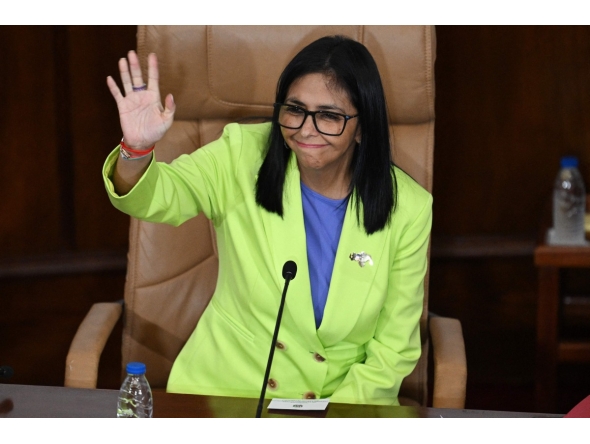Venezuela's interim President Delcy Rodriguez waves during a presidential address to Parliament at the National Assembly in Caracas on January 15, 2026 (Photo by Federico PARRA / AFP)