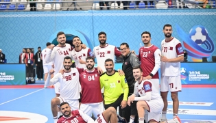 Qatar players celebrate after qualifying for the semi-final.