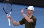 Italy's Jannik Sinner celebrates beating Italy's Luciano Darderi in their men's singles match on day nine of the Australian Open tennis tournament in Melbourne on January 26, 2026. (Photo by Izhar Khan / AFP)