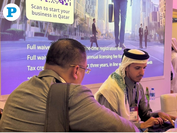 Qatar Financial Centre representative Abdullah Alsuliti (R). All photos by Mahmoud Elmazaty/The Peninsula.