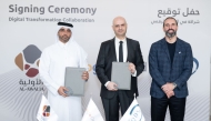 Chief Executive Officer of Alawalia Abdulaziz Ibrahim Al-Tamimi, Regional General Manager at Google Cloud Ghassan Kosta, and General Manager of QDS Mohammad Alam during the signing ceremony.  