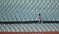 Empty stands are seen during the 2026 ICC Men's T20 Cricket World Cup group stage match between Scotland and West Indies at the Eden Gardens in Kolkata on February 7, 2026. (Photo by Dibyangshu Sarkar / AFP)