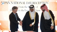 Minister of Transport H E Sheikh Mohammed bin Abdulla bin Mohammed Al Thani and Japan’s Ambassador H E Naoto Hisajima cut  the cake to celebrate the 66th birthday of H M Emperor Naruhito. PIC: Ahmed Barakat/The Peninsula 
