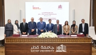 QU and WCM–Q officials during the signing of the agreement.