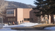 This photograph provided by local journalist Trent Ernst shows the middle school and high school building where a shooting took place, leaving at least nine people dead in the small town of Tumbler Ridge, British Columbia, on February 10, 2026. (Photo by Trent Ernst / AFP)