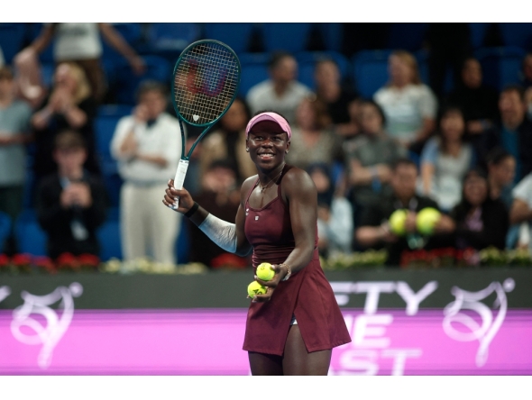 Canada's Victoria Mboko reacts after beating Latvia's Jelena Ostapenko in semi-final match at the Qatar Open tennis tournament in Doha on February 13, 2026. (Photo by Karim Jaafar / AFP)