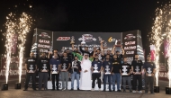 QRC Director General Sheikh Jabor bin Khalid Al Thani poses with the podium winners of the final round.  
