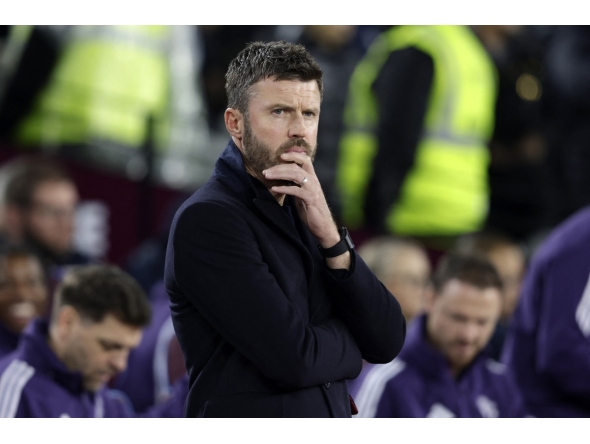 Manchester United's English Interim head coach Michael Carrick reacts ahead of the English Premier League football match between West Ham United and Manchester United at the London Stadium in east London on February 10, 2026. (Photo by Ian Kington / AFP) 