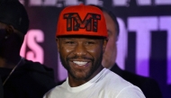 US boxer Floyd Mayweather Jr. smiles during the weighing ceremony for his upcoming exhibition fight against John Gutti III in Mexico City on August 23, 2024. . (Photo by Alfredo Estrella/ AFP)