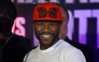 US boxer Floyd Mayweather Jr. smiles during the weighing ceremony for his upcoming exhibition fight against John Gutti III in Mexico City on August 23, 2024. . (Photo by Alfredo Estrella/ AFP)