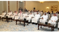 MoT Undersecretary H E Mohammed Abdullah Al-Maadeed and other officials during the workshop.