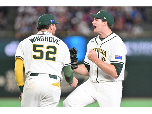 Australia's closing pitcher Jon Kennedy (R) celebrates victory over Taiwan at the World Baseball Classic (WBC) Pool C first round game between Australia and Taiwan at the Tokyo Dome on March 5, 2026. (Photo by Kazuhiro Nogi/ AFP) 