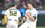 Australia's closing pitcher Jon Kennedy (R) celebrates victory over Taiwan at the World Baseball Classic (WBC) Pool C first round game between Australia and Taiwan at the Tokyo Dome on March 5, 2026. (Photo by Kazuhiro Nogi/ AFP) 