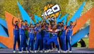 Indian players celebrate with the trophy after winning the 2026 ICC Men's T20 cricket World Cup final match against New Zealand at the Narendra Modi Stadium in Ahmedabad on March 8, 2026. (Photo by Punit PARANJPE / AFP)