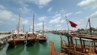 Traditional dhow boats are moored along the corniche in Doha on March 10, 2026. Photo by AFP