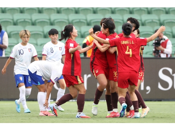 China players (R) celebrate a goal by teammate Shao Ziqin during the AFC Women's Asian Cup Australia 2026 football match between China and Taiwan in Perth. (Photo by Antony Dickson/ AFP) 