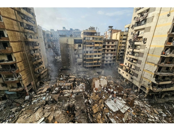  A photograph shows the site of an overnight Israeli airstrike that targeted the Haret Hreik neighbourhood of Beirut's southern suburbs on March 14, 2026.