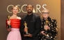 (L-R) Jessie Buckley, Michael B. Jordan, and Amy Madigan pose in the press room. Mike Coppola/Getty Images/AFP 