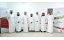 CEO of Thani Bin Abdullah Foundation for Humanitarian Services, Ayed bin Dabsan Al-Qahtani, with officials from the foundation's Gharimin Committee.