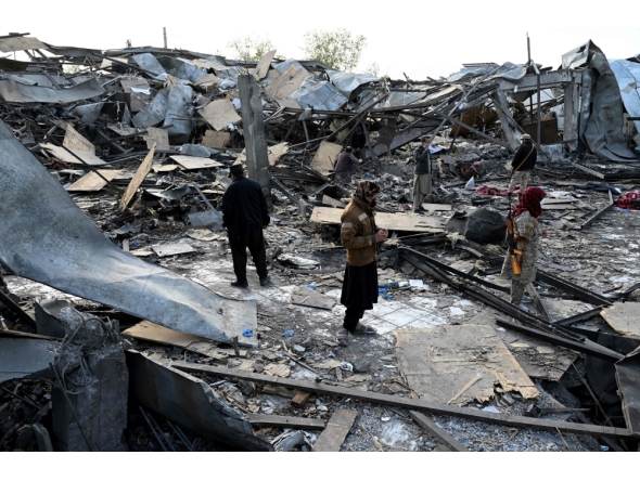 Taliban security personnel inspect the site after Pakistani airstrikes hit the Secondary Rehabilitation Services Centre in Kabul on March 17, 2026. (Photo by Wakil Kohsar / AFP)