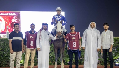 The connections of Aaneef Zakhir celebrate their win. PIC: Juhaim/QREC