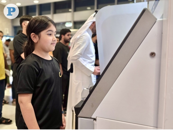 File photo of a child at Eidiya ATM 