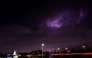 Lightning streaks across the sky during a thunderstorm over Doha on March 25, 2026. Photo by Karim JAAFAR / AFP