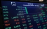 Stock market numbers are displayed on the floor of the New York Stock Exchange during morning trading on March 25, 2026 in New York City. Photo by Michael M. Santiago / GETTY IMAGES NORTH AMERICA / Getty Images via AFP