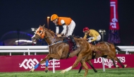 Rayyan Bu Thaila and jockey Pierre Charles Boudot on their way to win the Al Uqda Local Thoroughbred Trophy. PIC: JUHAIM/QREC
