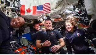 This screengrab taken from a NASA livestream shows Artemis II mission astronauts (L-R) NASA's pilot Victor Glover, NASA commander Reid Wiseman, Canadian Space Agency's mission specialist Jeremy Hansen and NASA's mission specialist Christina Koch as they attend a 