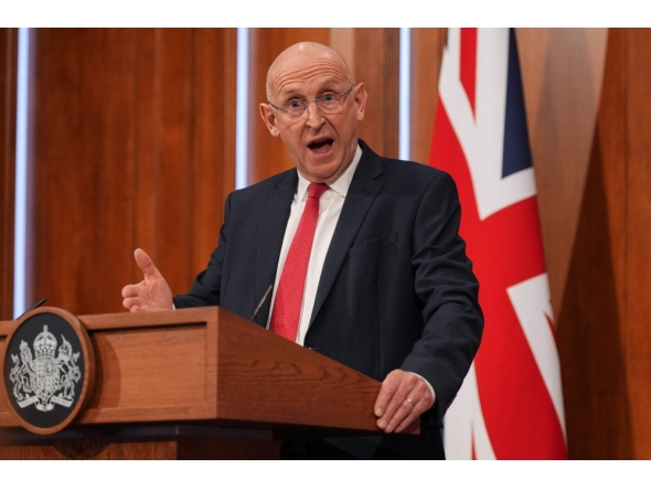 Britain's Defence Secretary John Healey delivers a statement on recent UK operational activity at 9 Downing Street in central London on April 9, 2026.  (Photo by Yui Mok / POOL / AFP)