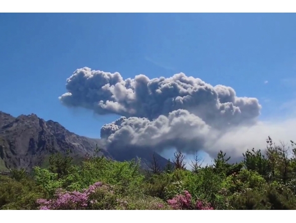 This screen grab made from UGC footage courtesy of X user @SEACHICKEN_1059 taken on April 11, 2026 and made available on April 13 shows Sakurajima, one of Japan's most active volcanoes, erupting in Japan's Kagoshima Prefecture. Photo by Handout / COURTESY OF @SEACHICKEN_1059 / AFP