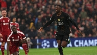 Paris Saint-Germain's French forward #10 Ousmane Dembele celebrates scoring his team's first goal during the UEFA Champions League quarter final, second-leg football match between Liverpool and Paris Saint-Germain at Anfield in Liverpool, north west England on April 14, 2026. (Photo by FRANCK FIFE / AFP)